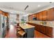 Bright kitchen boasts granite countertops, stainless steel appliances, and a large island with seating at 1822 Painter Dr, Monument, CO 80132