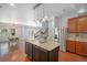 Spacious kitchen with stainless steel appliances, granite countertops, and a center island at 1822 Painter Dr, Monument, CO 80132