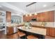 Modern kitchen with stainless steel appliances, granite countertops, and a center island with seating at 1822 Painter Dr, Monument, CO 80132