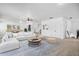 Spacious living room features modern decor and a billiard table for added recreation at 1822 Painter Dr, Monument, CO 80132