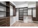 Spacious walk-in closet with custom shelving and ample storage space at 1822 Painter Dr, Monument, CO 80132