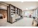 Open basement with cabinets and shelving at 440 Scrub Oak Cir, Monument, CO 80132