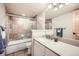 Bathroom with tiled shower and updated vanity at 440 Scrub Oak Cir, Monument, CO 80132