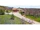 Well-maintained home with a long driveway and two car garage at 440 Scrub Oak Cir, Monument, CO 80132