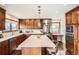 Spacious kitchen with stainless steel appliances and a large kitchen island at 440 Scrub Oak Cir, Monument, CO 80132