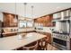 Spacious kitchen with stainless steel appliances and a large kitchen island at 440 Scrub Oak Cir, Monument, CO 80132