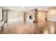 Bright living room with stone fireplace and hardwood floors at 440 Scrub Oak Cir, Monument, CO 80132