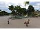 This outdoor playground has multiple slides, spring toys and ample space for children to play at 5046 S Evanston St, Aurora, CO 80015