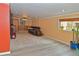 Spacious finished basement offering a comfortable living area with new flooring and ample lighting at 11964 W 71St Pl, Arvada, CO 80004