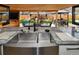 Stainless steel kitchen sink with a view into the backyard patio at 11964 W 71St Pl, Arvada, CO 80004