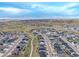 This aerial view shows the community with walking trails and views of the rolling hills at 4925 Coltin Trl, Castle Rock, CO 80104