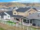 This home features a spacious backyard with a lush lawn, perfect for outdoor activities and relaxation at 4925 Coltin Trl, Castle Rock, CO 80104