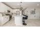 Stylish kitchen with modern appliances, a large island, and pendant lighting at 4925 Coltin Trl, Castle Rock, CO 80104