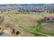 Scenic community view with green spaces, walking paths, and various home styles at 4925 Coltin Trl, Castle Rock, CO 80104