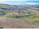 Expansive neighborhood view featuring a mix of green spaces, walking trails, and diverse housing options at 4925 Coltin Trl, Castle Rock, CO 80104