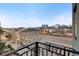 Balcony view featuring the city's skyline, bridge, and surrounding landscape at twilight at 1521 Central St # 3C, Denver, CO 80211