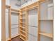 Spacious walk-in closet featuring custom shelving and ample storage space at 1521 Central St # 3C, Denver, CO 80211
