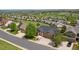 Aerial view of residential neighborhood with well-manicured lawns and mature trees at 7120 Red Mesa Dr, Littleton, CO 80125