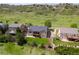 Aerial view showcasing the backyard, deck, and scenic surroundings of the property at 7120 Red Mesa Dr, Littleton, CO 80125