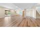 Finished basement with sliding doors and wood-look flooring at 7120 Red Mesa Dr, Littleton, CO 80125