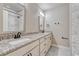 Double vanity bathroom with granite countertop at 91 Greeley Blvd, Palmer Lake, CO 80133