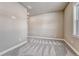 Room with neutral walls and plush carpeting, offering a versatile space for various uses at 91 Greeley Blvd, Palmer Lake, CO 80133