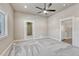 Bright bedroom with large windows and carpet flooring at 91 Greeley Blvd, Palmer Lake, CO 80133