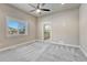 Bright bedroom featuring a large window and plush carpeting at 91 Greeley Blvd, Palmer Lake, CO 80133