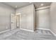 Neutral carpeted bedroom featuring trim and doors at 91 Greeley Blvd, Palmer Lake, CO 80133
