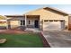 Charming single-story home with stucco exterior, stone accents, and a well-manicured lawn at 91 Greeley Blvd, Palmer Lake, CO 80133