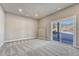 Unfurnished living room featuring recessed lighting and a sliding glass door at 91 Greeley Blvd, Palmer Lake, CO 80133