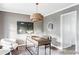 Stylish home office with modern desk, artwork, and elegant lighting perfect for remote work at 7154 S Hudson Cir, Centennial, CO 80122