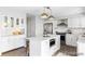 Spacious kitchen featuring a center island, stainless steel appliances, built-in microwave, and ample counter space at 7154 S Hudson Cir, Centennial, CO 80122