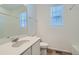 Bathroom with a single vanity and tub/shower combination at 6634 N Malta St, Aurora, CO 80019