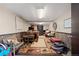 The finished basement includes a seating area with rustic decor, wood paneling, and unique touches at 1705 Outter Marker Rd, Castle Rock, CO 80108