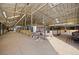 View of horse barn featuring stalls, wash rack and lounge area, designed for optimal animal care and convenience at 1705 Outter Marker Rd, Castle Rock, CO 80108