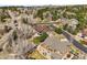 Aerial view of neighborhood, showcasing the surrounding trees and landscaping at 7003 S Irvington Ct, Aurora, CO 80016