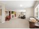 Spacious basement with fireplace, entertainment area, and a game table at 7003 S Irvington Ct, Aurora, CO 80016