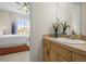 A partial view of the vanity in the bathroom, next to the bedroom at 7003 S Irvington Ct, Aurora, CO 80016