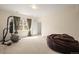 Bright bedroom with large window, cozy beanbag chair, and ample space at 7003 S Irvington Ct, Aurora, CO 80016
