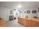 Bright office space with a large desk and neutral decor at 7003 S Irvington Ct, Aurora, CO 80016
