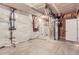 Unfinished basement with exposed utilities and concrete floor, ready for customization at 9422 E 58Th Pl, Denver, CO 80238