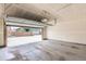 Spacious garage with an automatic door, offering convenient and secure parking at 9422 E 58Th Pl, Denver, CO 80238