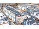 Overhead view of a modern townhome neighborhood, complete with rooftop decks and solar panels at 3142 W 20Th Ave, Denver, CO 80211