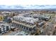 Wide aerial view showcasing a residential community with modern townhomes and city views at 3142 W 20Th Ave, Denver, CO 80211