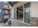 Spacious balcony with sliding glass doors leading to the dining area, offering seamless indoor-outdoor living at 3142 W 20Th Ave, Denver, CO 80211