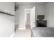 Bedroom featuring a grey color scheme, open doorway, and dresser at 3142 W 20Th Ave, Denver, CO 80211