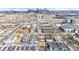 Stunning aerial view capturing the city skyline from a residential area, highlighting the urban landscape at 3142 W 20Th Ave, Denver, CO 80211