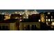 Night view of downtown Denver from the property's roof, showcasing the city skyline lights at 3142 W 20Th Ave, Denver, CO 80211
