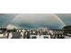 Urban view of Denver skyline featuring an arching rainbow after a storm passes at 3142 W 20Th Ave, Denver, CO 80211